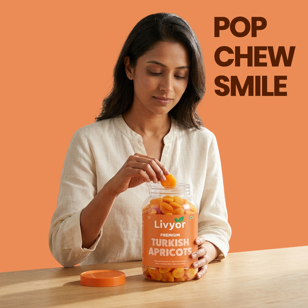 Person enjoying Livyor Turkish dried apricots khubani